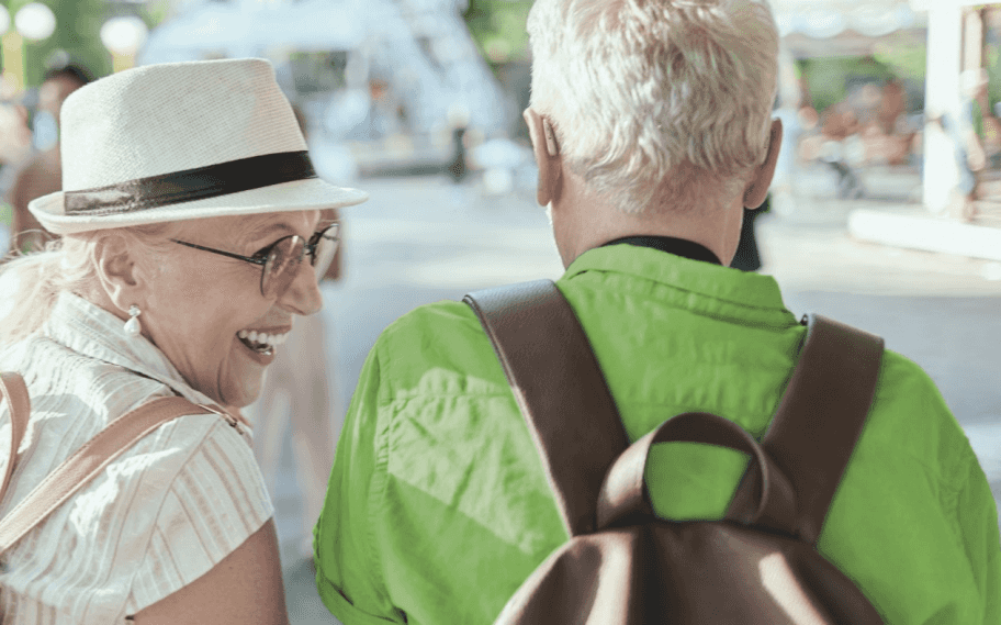 husband wife wear hearing aids to walk outdoors